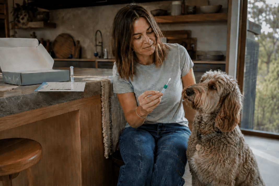 woman does pet dna test with her mixed breed dog