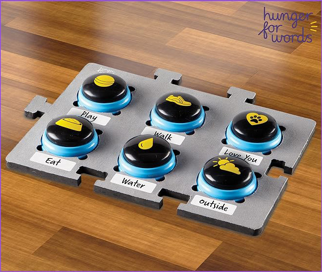 Hunger For Words Dog Button panel with labels for common first words