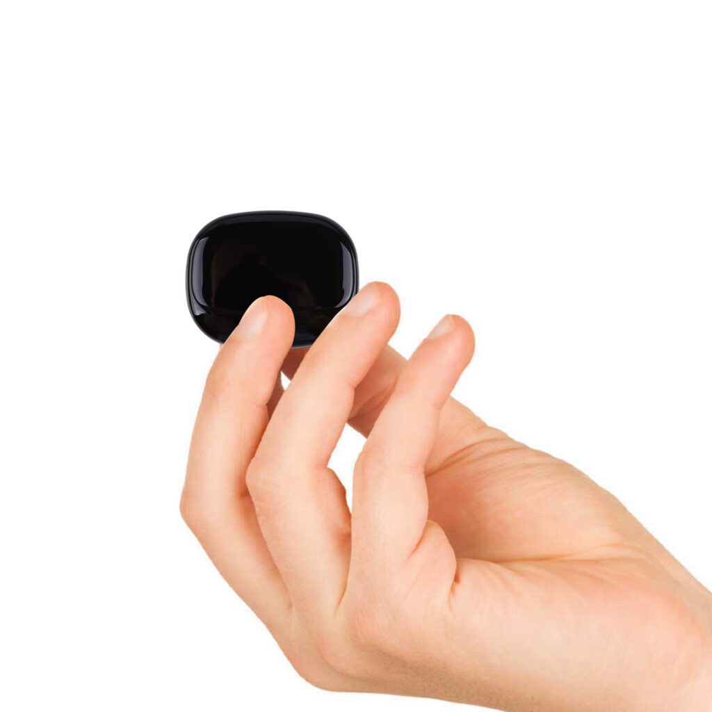 hand holding a pet tracker